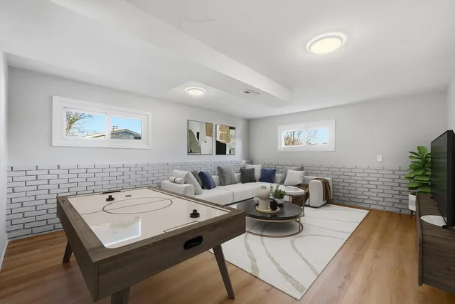 a view of a street with a large tree