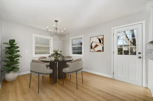 a bathroom with a sink a vanity and a mirror
