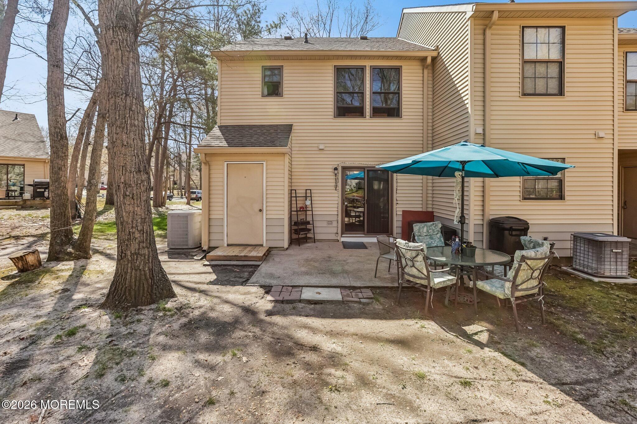 197 Azalea Circle Jackson, NJ 08527 - Photo 11 of 33 a view of a house with backyard and sitting area
