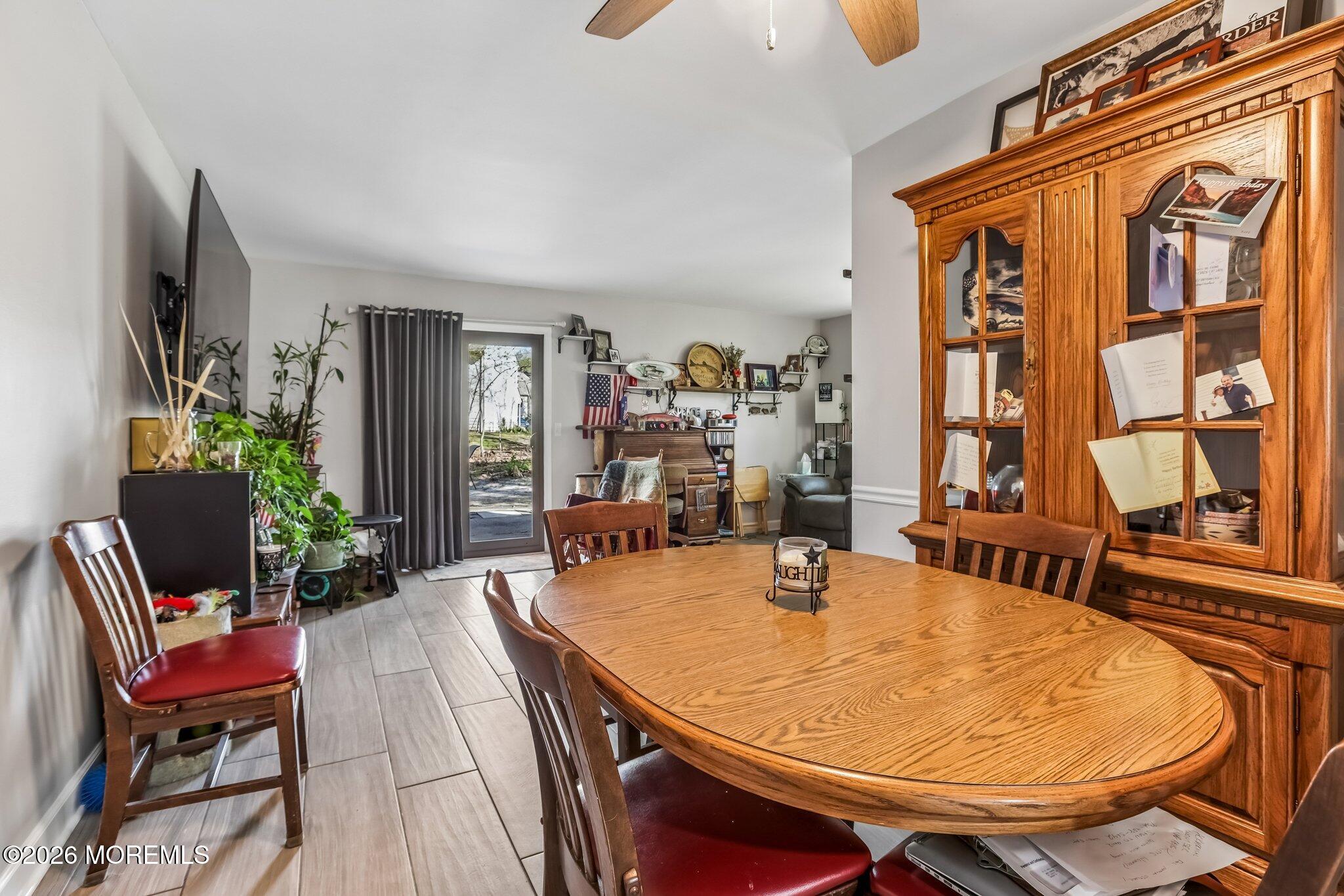 197 Azalea Circle Jackson, NJ 08527 - Photo 17 of 33 a view of a dining room with furniture and window