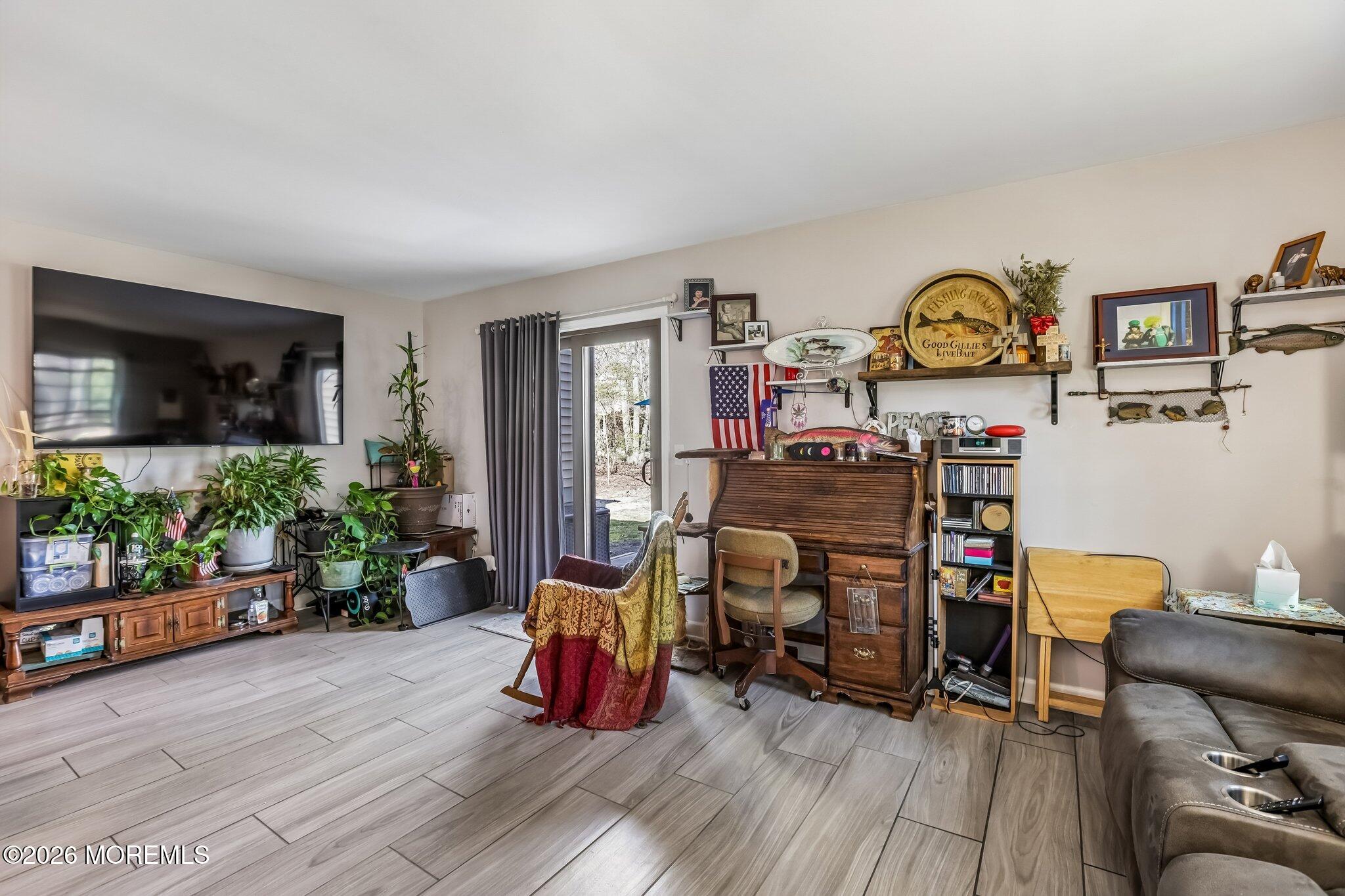 197 Azalea Circle Jackson, NJ 08527 - Photo 20 of 33 a view of a workspace with furniture and toys