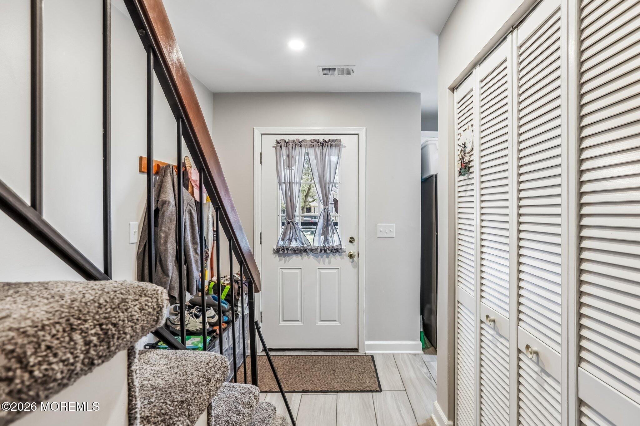 197 Azalea Circle Jackson, NJ 08527 - Photo 23 of 33 workspace with wooden floor and stairs