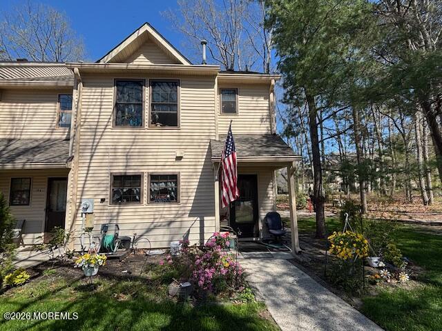 197 Azalea Circle Jackson, NJ 08527 - Photo 6 of 33 a front view of a house with garden