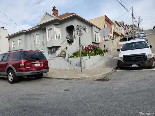 a car parked in front of a house