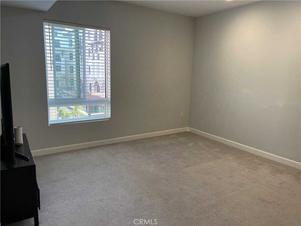 28 North 3rd Street, Unit B210 Alhambra, CA 91801 - Photo 3 of 9 an empty room with a window