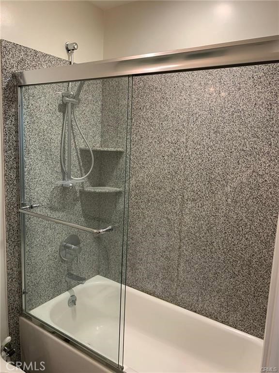 28 North 3rd Street, Unit B210 Alhambra, CA 91801 - Photo 5 of 9 a bathroom with a shower and a sink