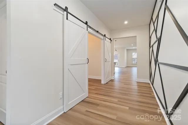 a view of entryway with wooden floor