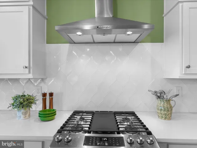 a bedroom with a bed and a table in it