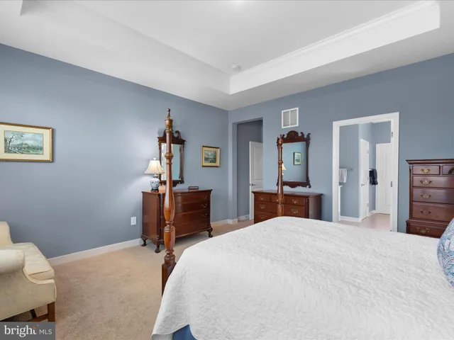 a view of a lake with outdoor seating