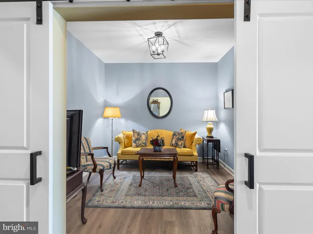 a bathroom with a double vanity sink and mirror