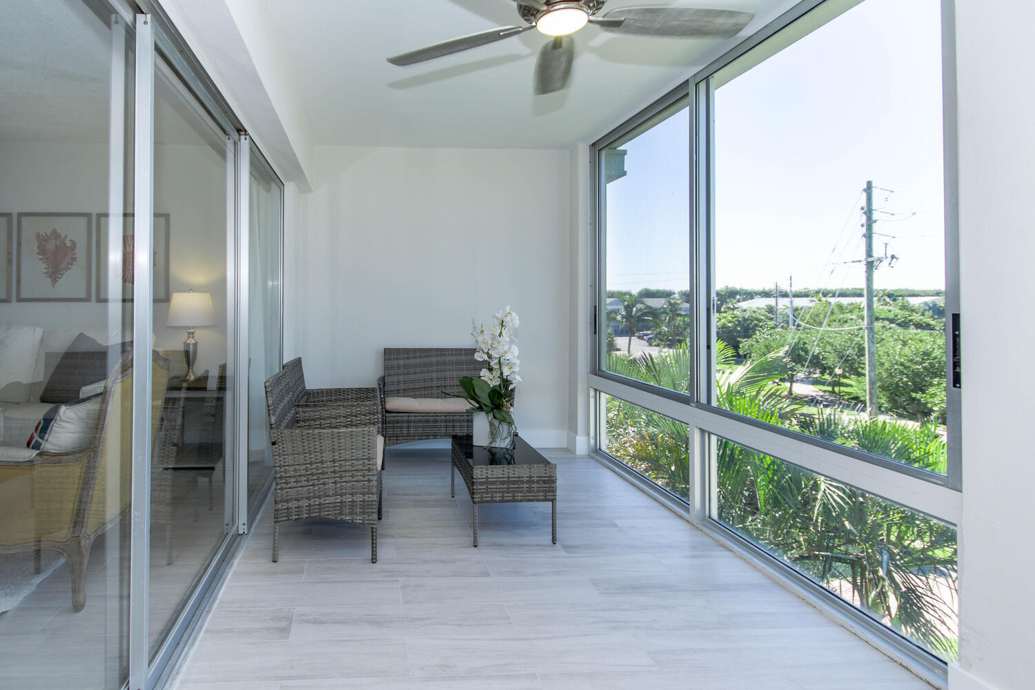 120 Celestial Way, Unit 302 Juno Beach, FL 33408 - Photo 30 of 55 a living room with furniture and a large window