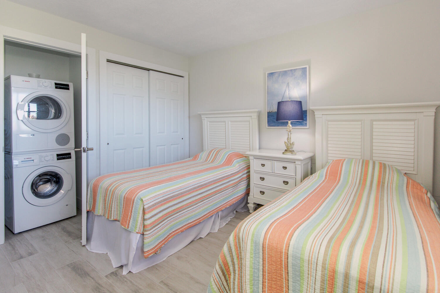 120 Celestial Way, Unit 302 Juno Beach, FL 33408 - Photo 39 of 55 a bedroom with a bed and a window