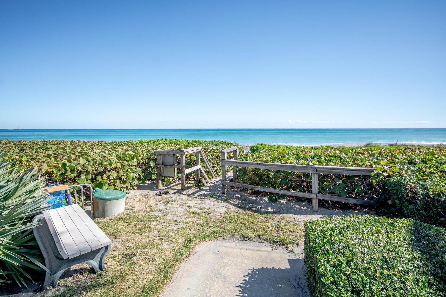 120 Celestial Way, Unit 302 Juno Beach, FL 33408 - Photo 52 of 55 a view of a chairs and table on the terrace