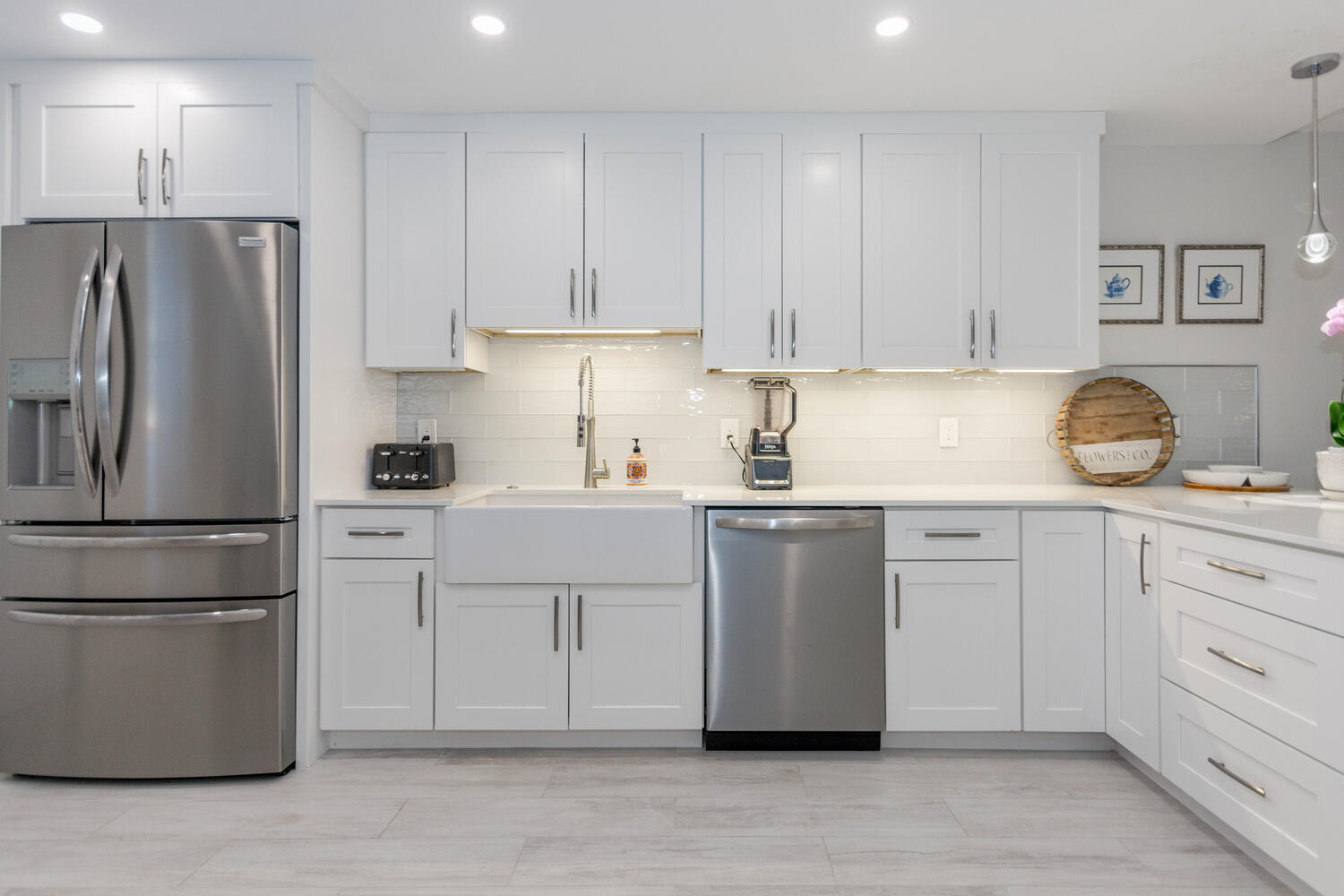 120 Celestial Way, Unit 302 Juno Beach, FL 33408 - Photo 6 of 55 a kitchen with cabinets appliances and a counter space