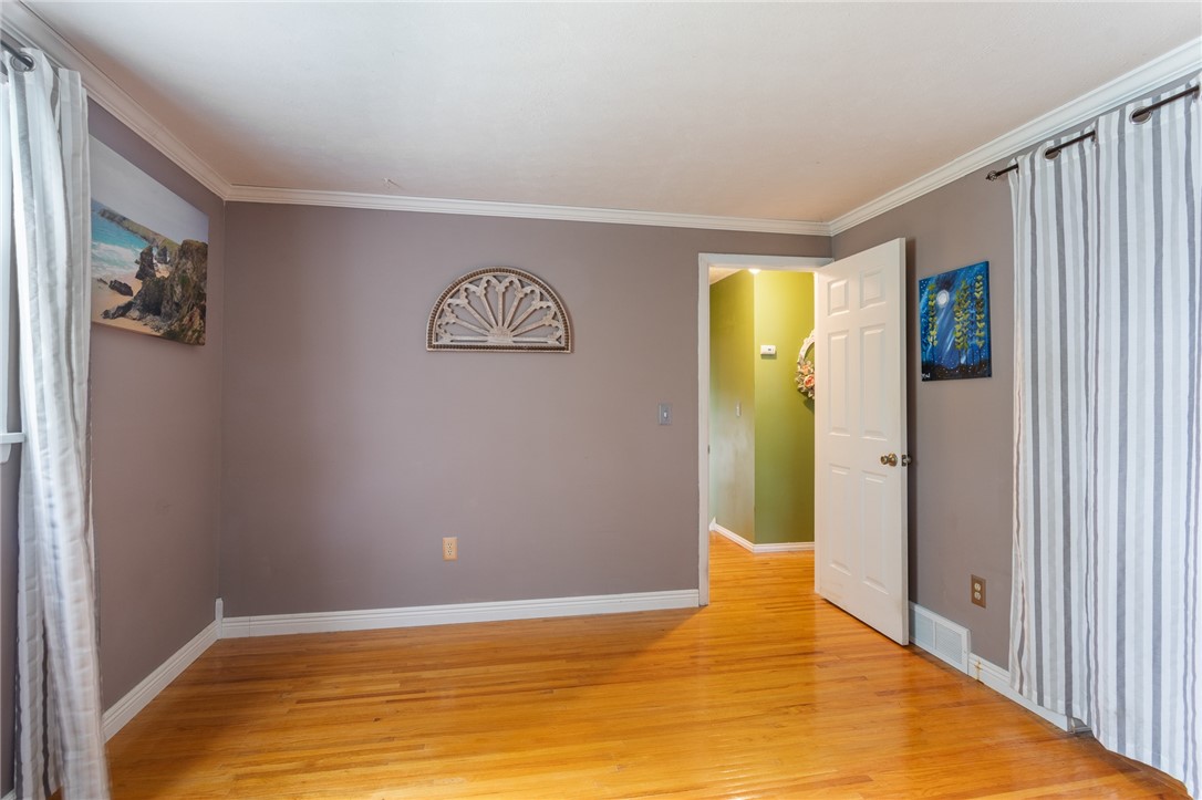 64 Elmford Road Gates, NY 14606 - Photo 20 of 37 One of the THREE BEDROOMS - exceptional hardwoods!