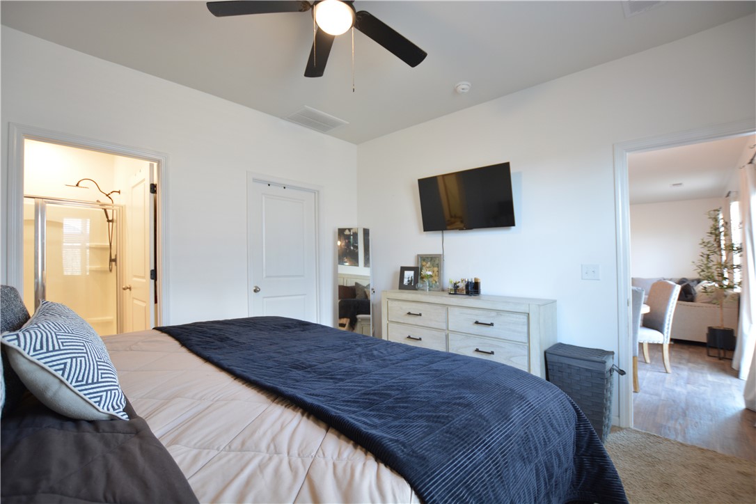 242 Hillendale Way Pelzer, SC 29669 - Photo 15 of 19 Bright and airy bedroom offering a serene retreat.