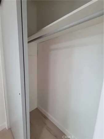 a stove top oven sitting inside of a kitchen