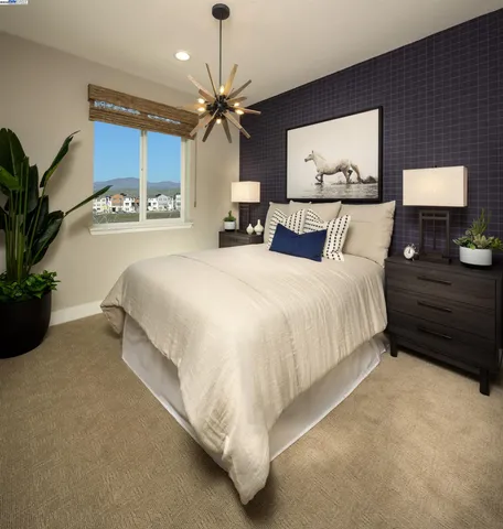 a bathroom with a double vanity sink toilet and mirror
