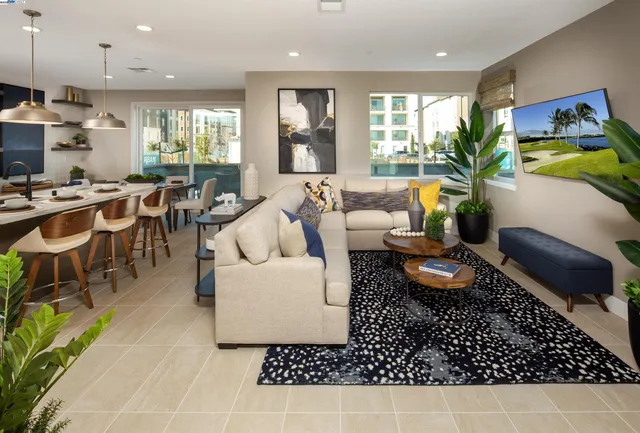 a living room with furniture and a table