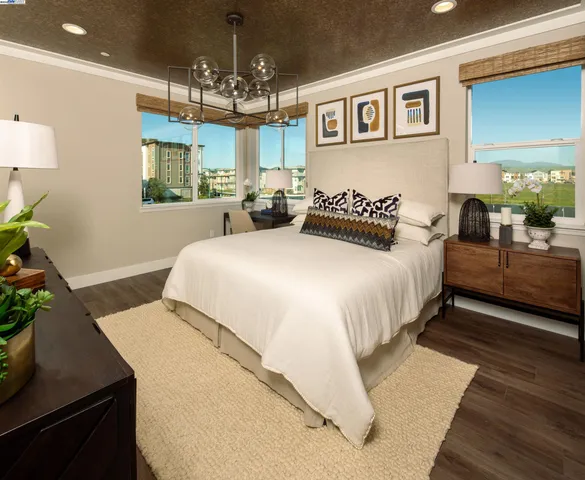 a hall with a sink and a mirror