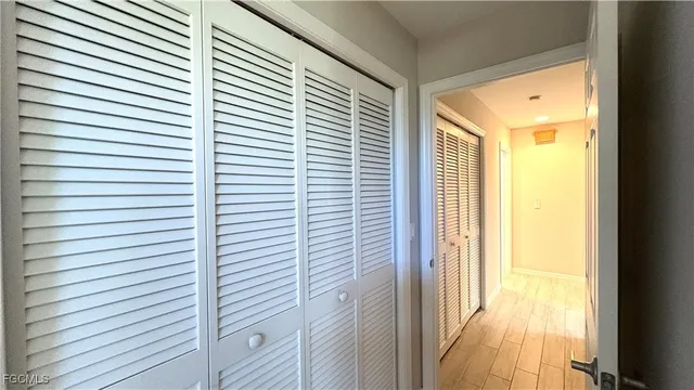 a view of a room with a large window