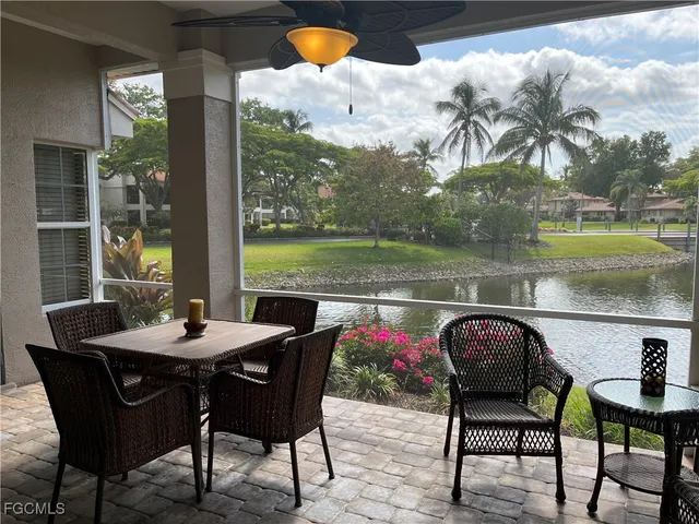 a dining area with furniture and table in kitchen