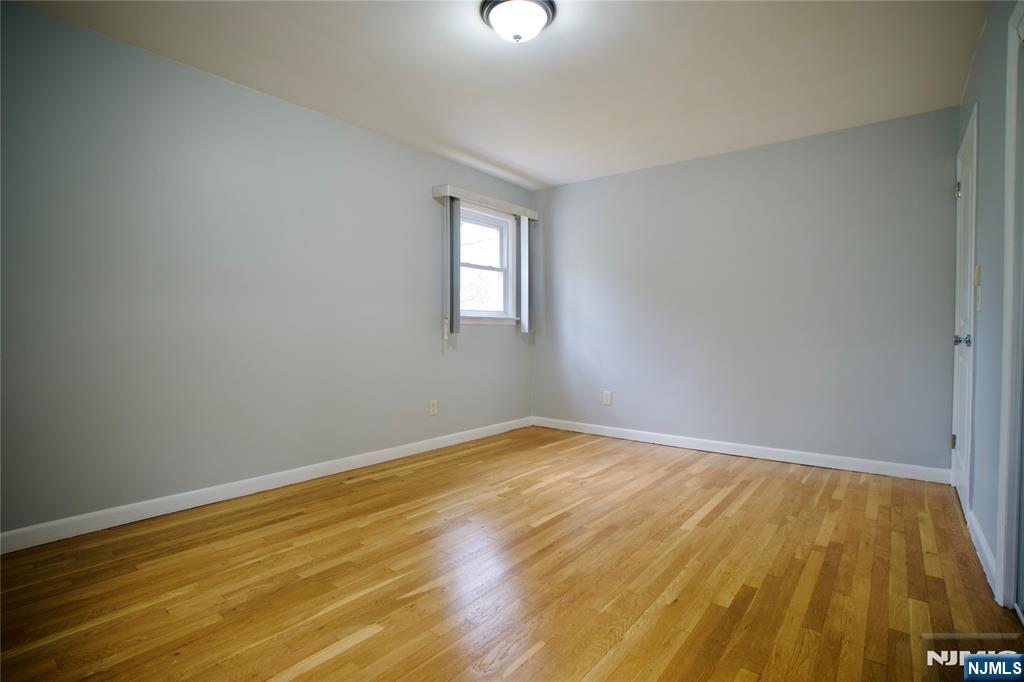 524 Studio Road, Unit 1 Ridgefield, NJ 07657 - Photo 24 of 44 a view of an empty room and window