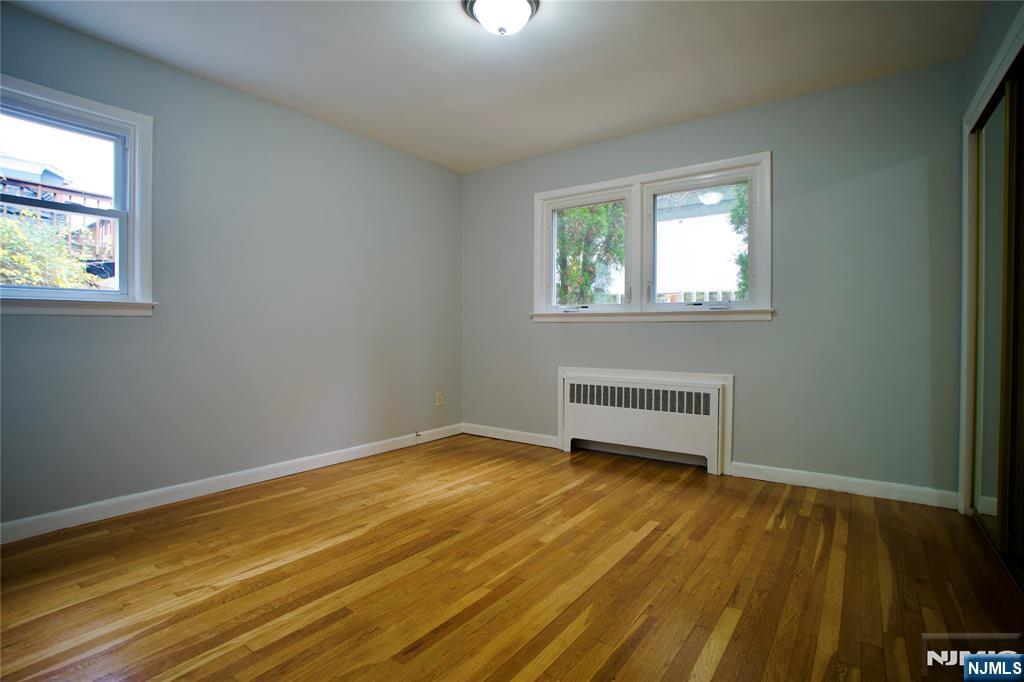 524 Studio Road, Unit 1 Ridgefield, NJ 07657 - Photo 28 of 44 an empty room with a window