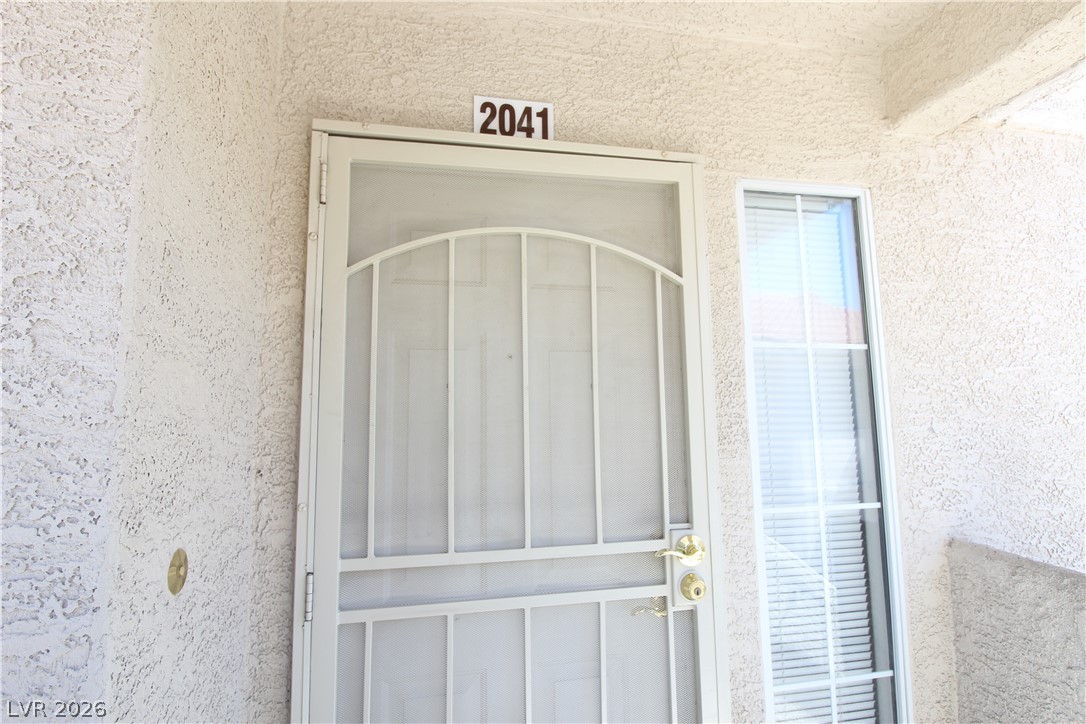 1881 West Alexander Road, Unit 2041 North Las Vegas, NV 89032 - Photo 17 of 20 FRONT DOOR OF UNIT