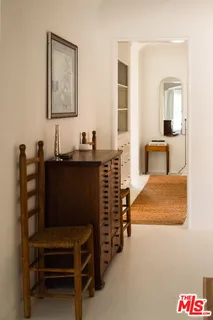 a bedroom with a bed and furniture