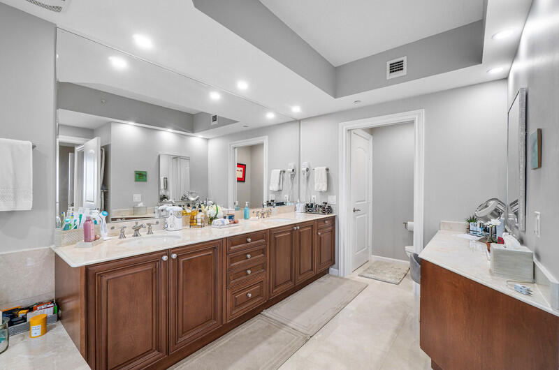 4600 North Ocean Drive, Unit 1603 Singer Island, FL 33404 - Photo 12 of 43 a bathroom with a double vanity sink mirror and double