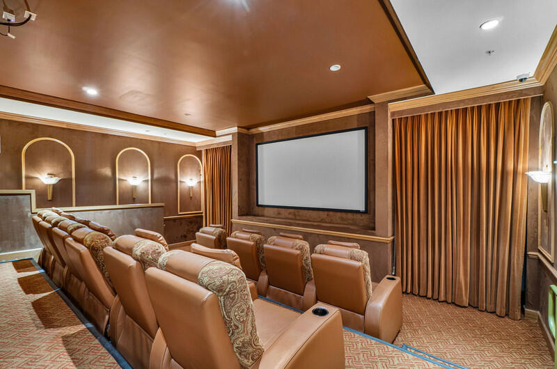 4600 North Ocean Drive, Unit 1603 Singer Island, FL 33404 - Photo 33 of 43 a media room with lots of chairs and a projector screen