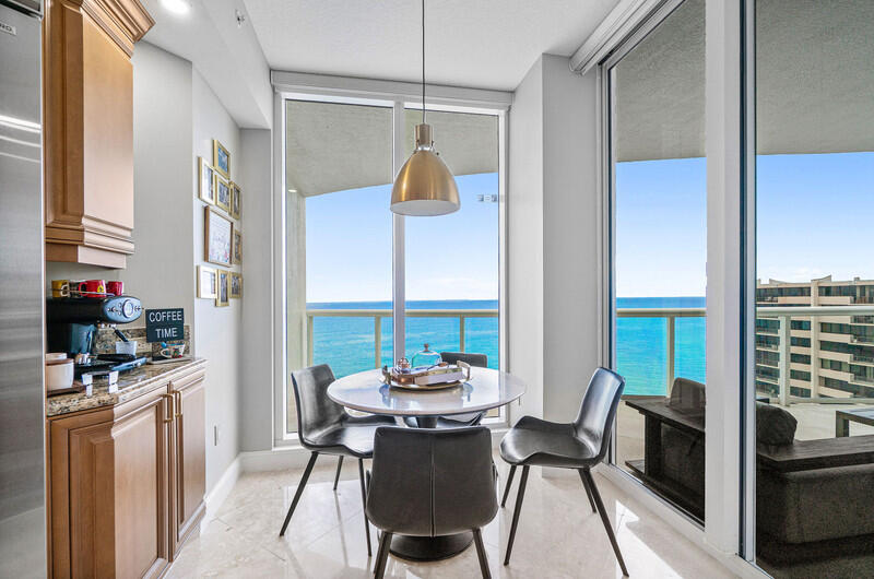 4600 North Ocean Drive, Unit 1603 Singer Island, FL 33404 - Photo 6 of 43 a view of a dining room with furniture window and outside view