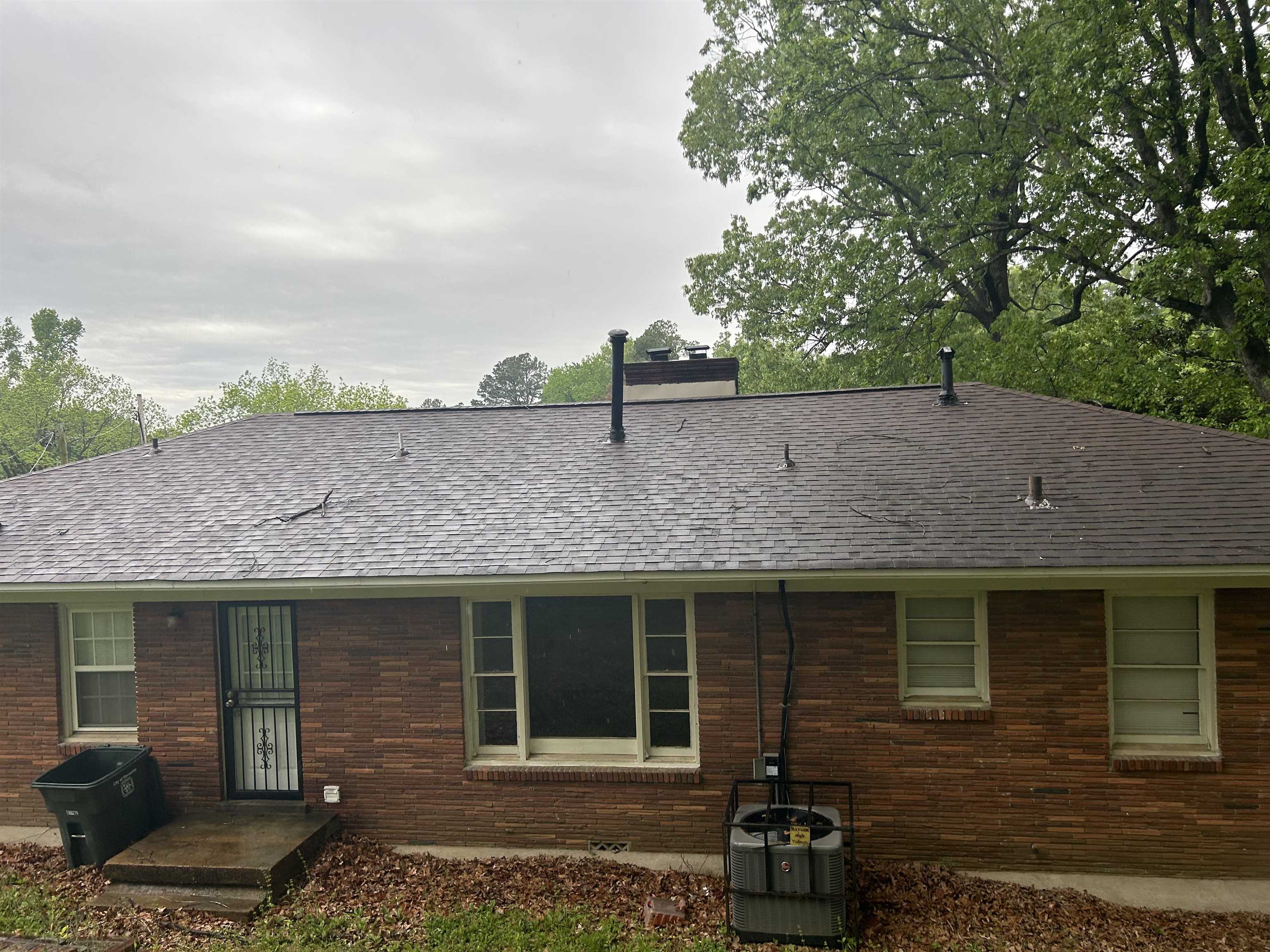 3282 Rickey Road Memphis, TN 38128 - Photo 4 of 4 a front view of a house with a garden