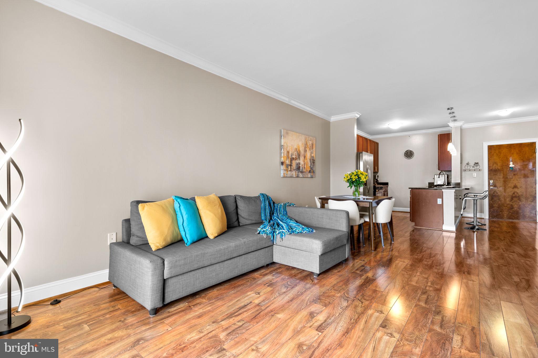 6301 Edsall Road, Unit 500 Alexandria, VA 22312 - Photo 11 of 30 a living room with furniture and wooden floor