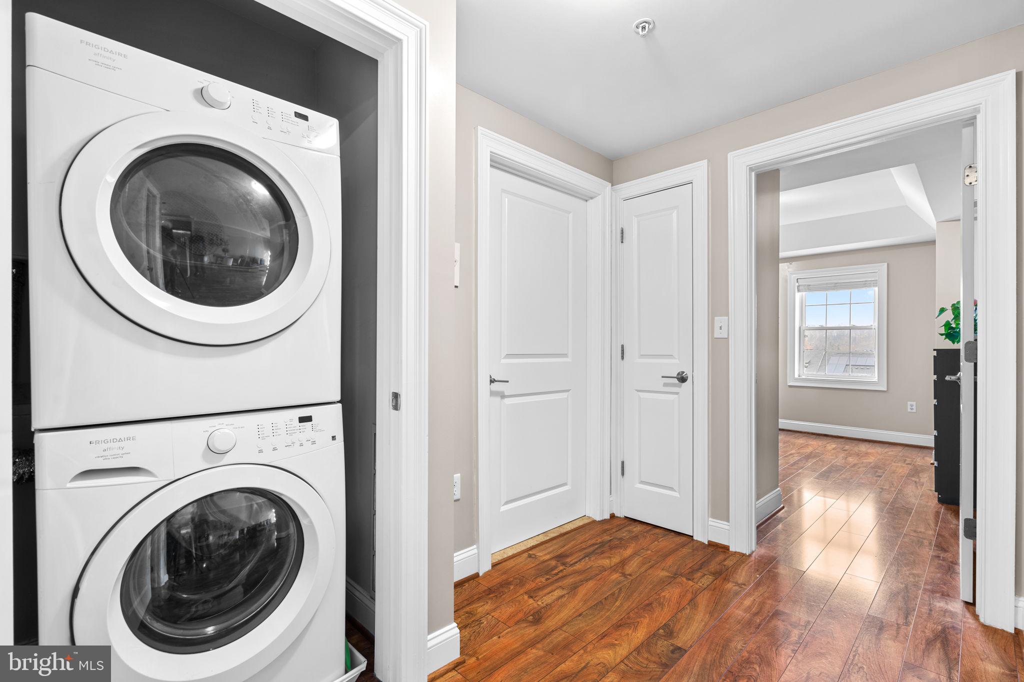 6301 Edsall Road, Unit 500 Alexandria, VA 22312 - Photo 18 of 30 a view of a hallway with washer and dryer