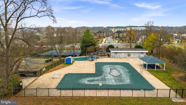a view of a swimming pool with a lake