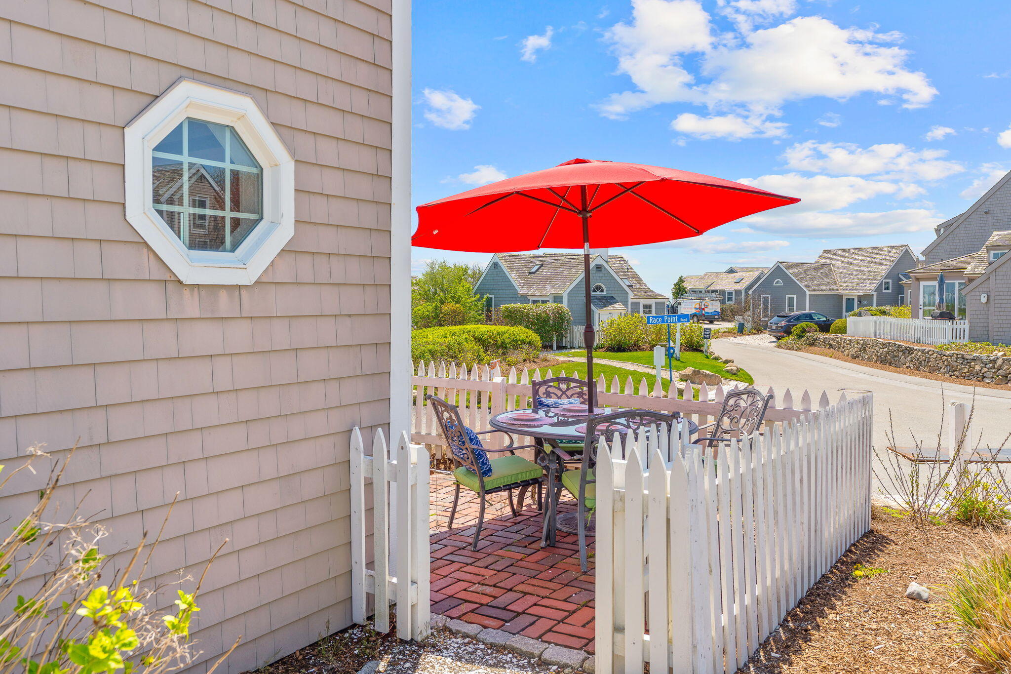 4 Race Point Road, Unit 4 Mashpee, MA 02649 - Photo 7 of 43 a view of a balcony with wooden floor
