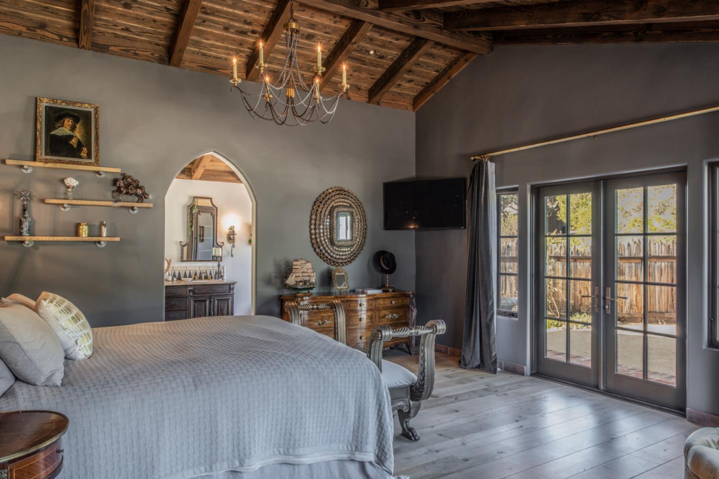 34 Rancho Road Carmel Valley, CA 93924 - Photo 16 of 22 a bed room with a bed and a chair