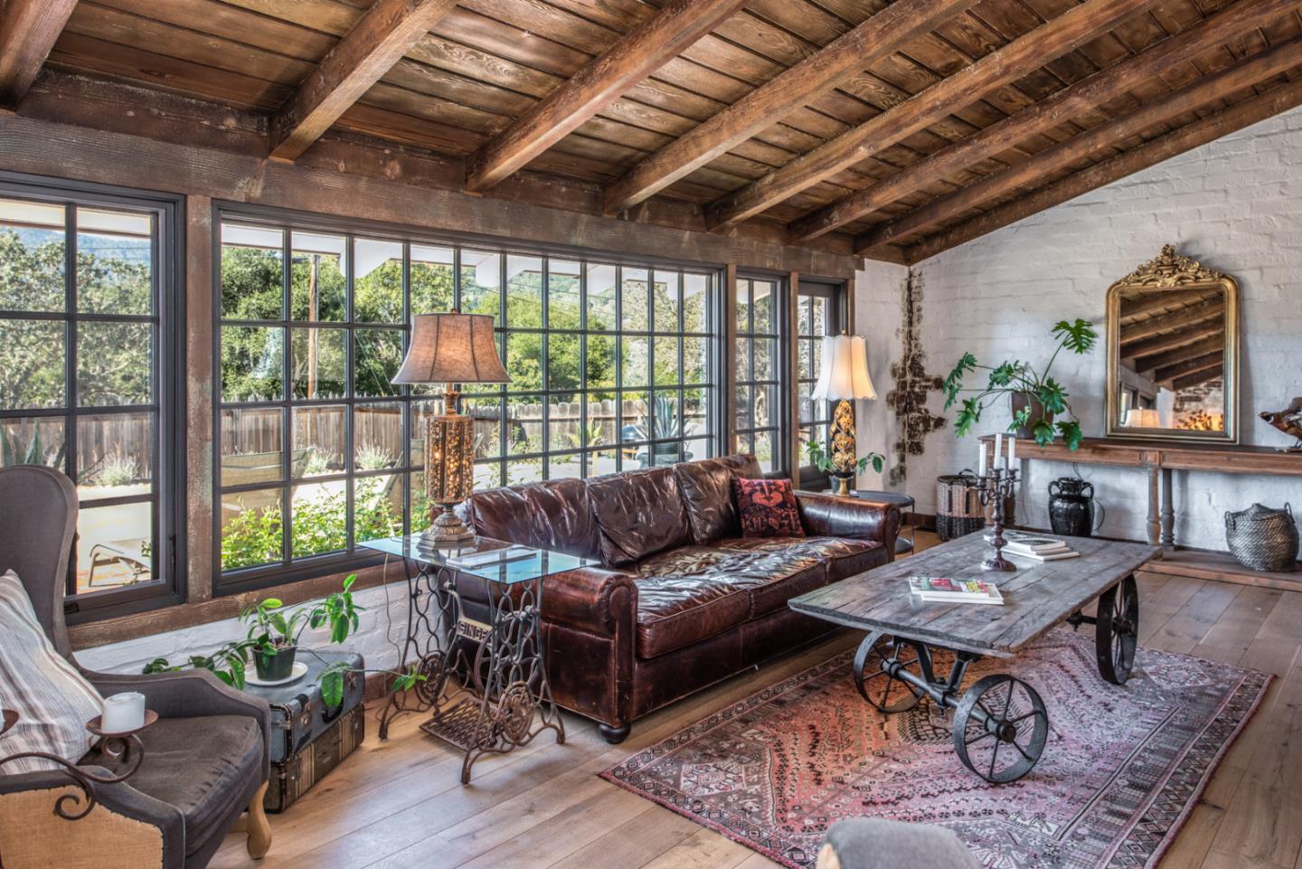 34 Rancho Road Carmel Valley, CA 93924 - Photo 4 of 22 a living room with furniture and a large window