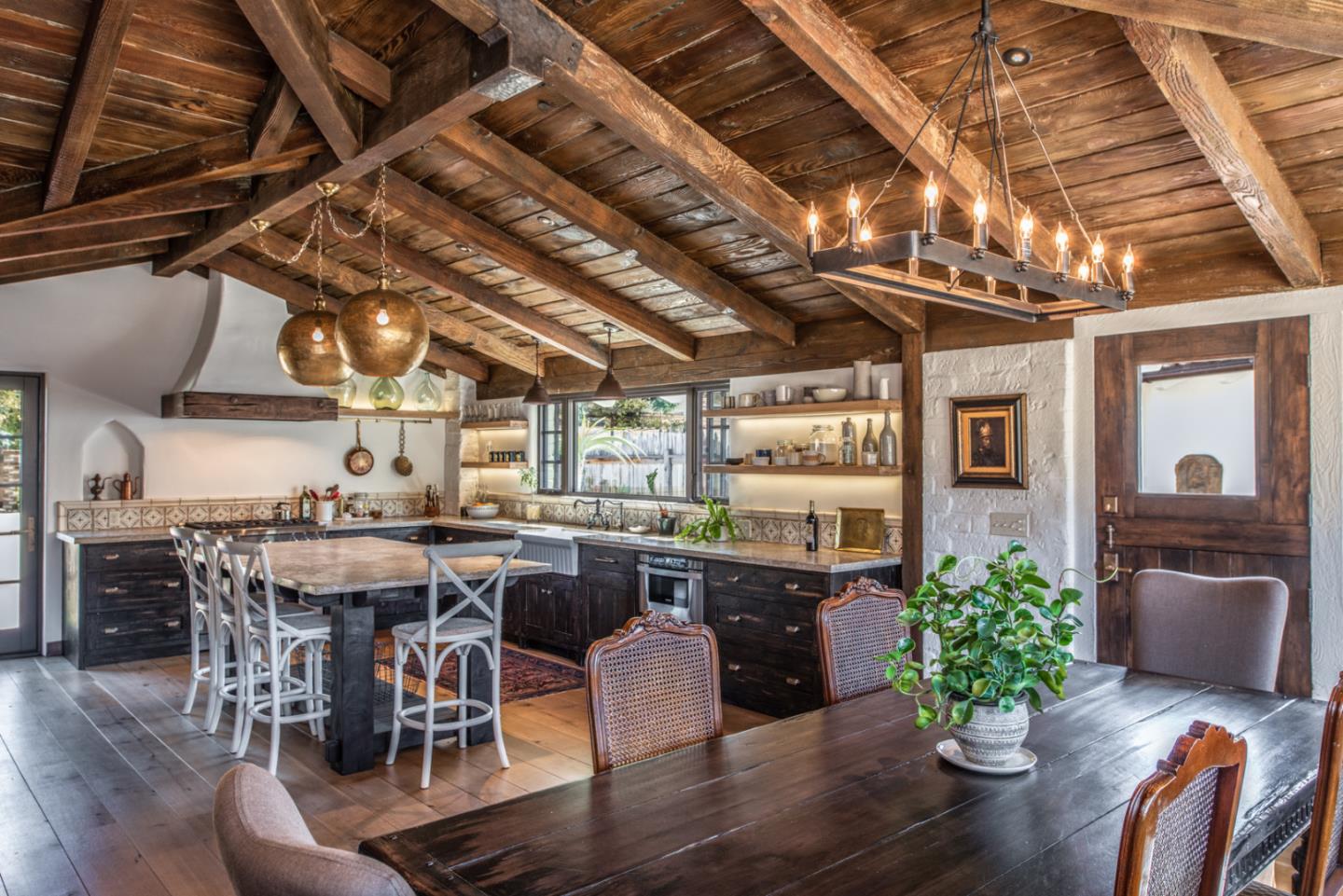 34 Rancho Road Carmel Valley, CA 93924 - Photo 6 of 22 a living room with lots of furniture and a chandelier