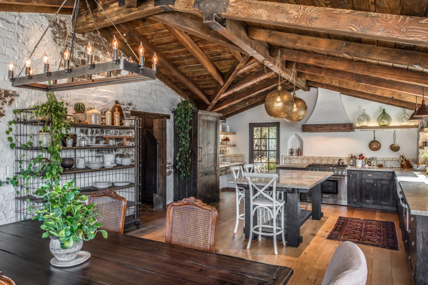 34 Rancho Road Carmel Valley, CA 93924 - Photo 7 of 22 a view of a dining room with furniture window and wooden floor