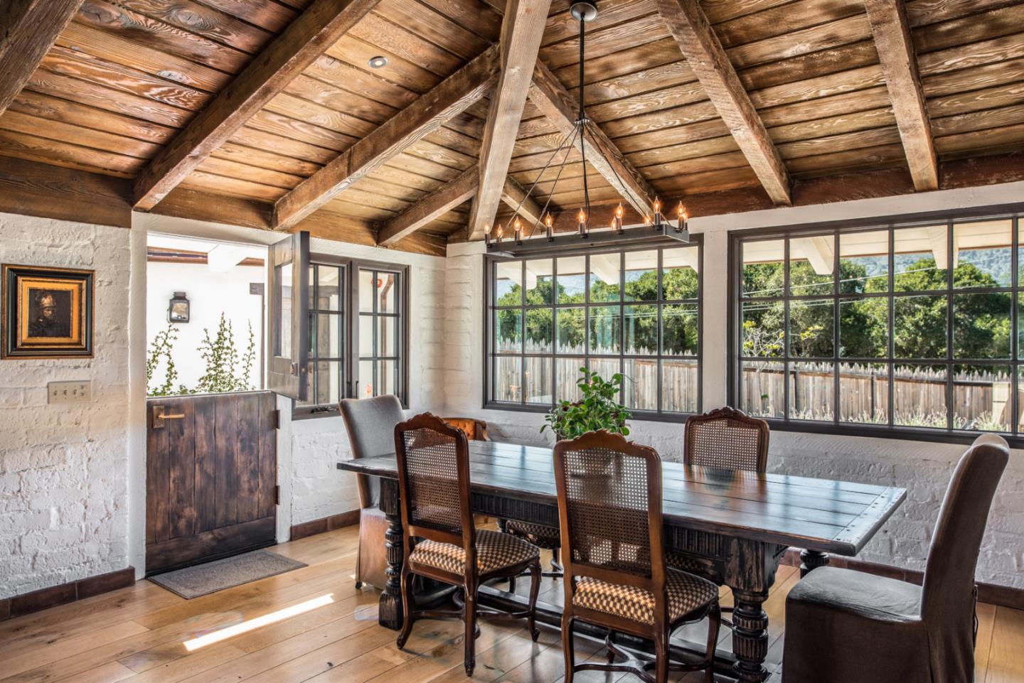 34 Rancho Road Carmel Valley, CA 93924 - Photo 9 of 22 a view of a dining room with furniture window and outside view