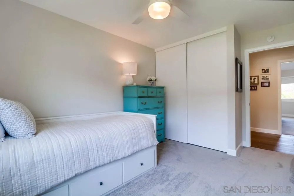 10544 Cadwell Road Santee, CA 92071 - Photo 18 of 27 a bedroom with a bed and a window