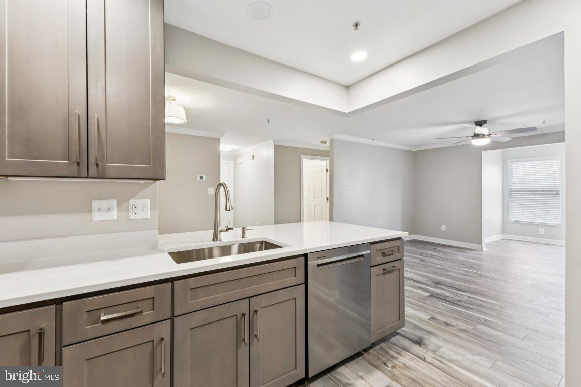 8311 A Bluebird Way, Unit A Lorton, VA 22079 - Photo 12 of 25 a kitchen with a sink and cabinets