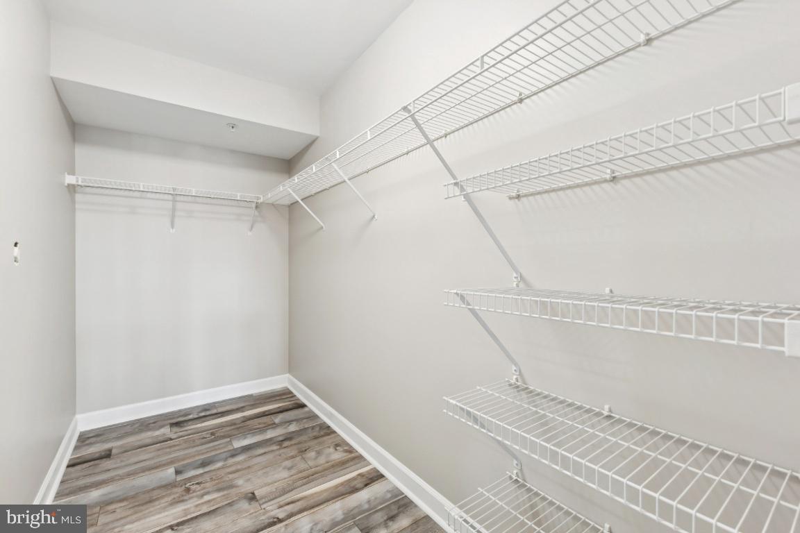 8311 A Bluebird Way, Unit A Lorton, VA 22079 - Photo 24 of 25 a view of a room with racks on the wall