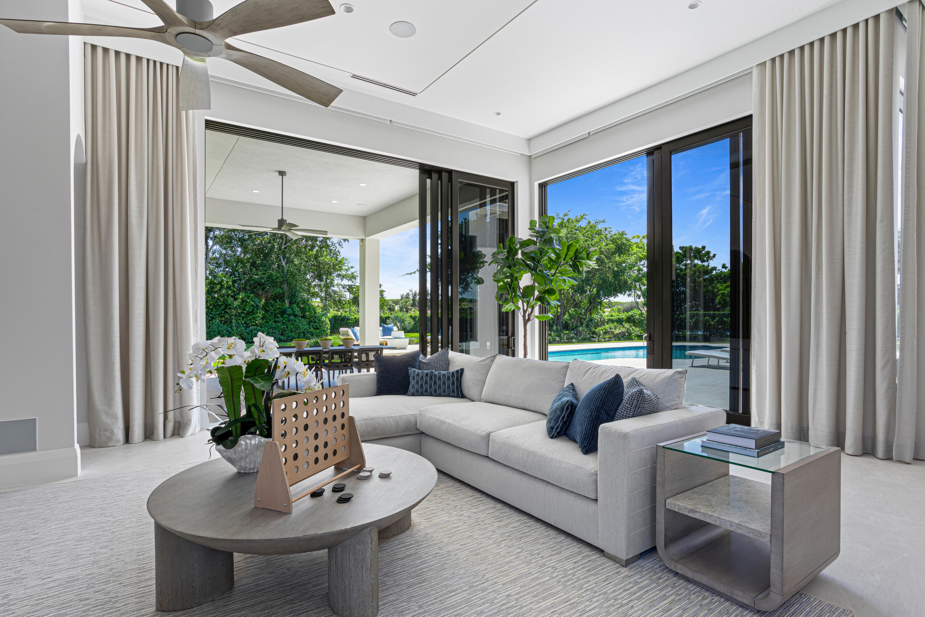 6009 Le Lac Road Boca Raton, FL 33496 - Photo 13 of 35 a living room with furniture and a large window
