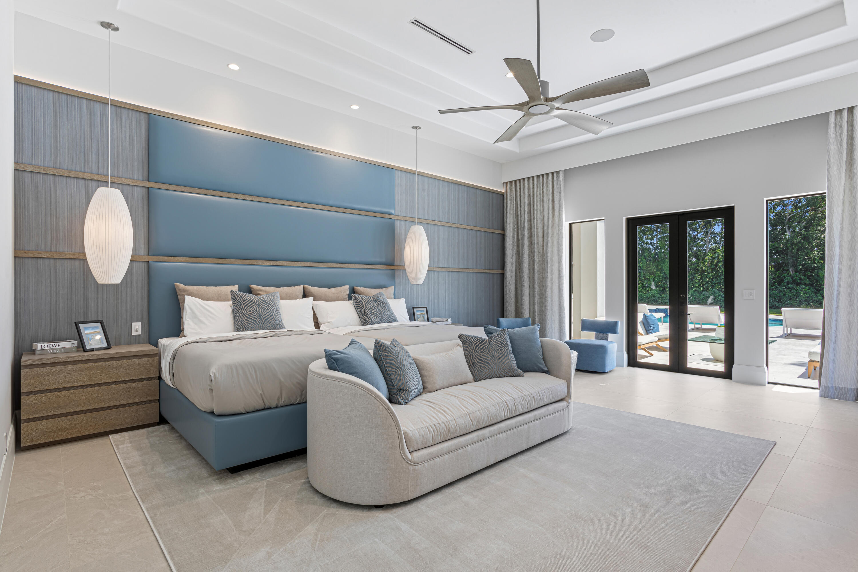 6009 Le Lac Road Boca Raton, FL 33496 - Photo 16 of 35 a spacious bedroom with a bed and window