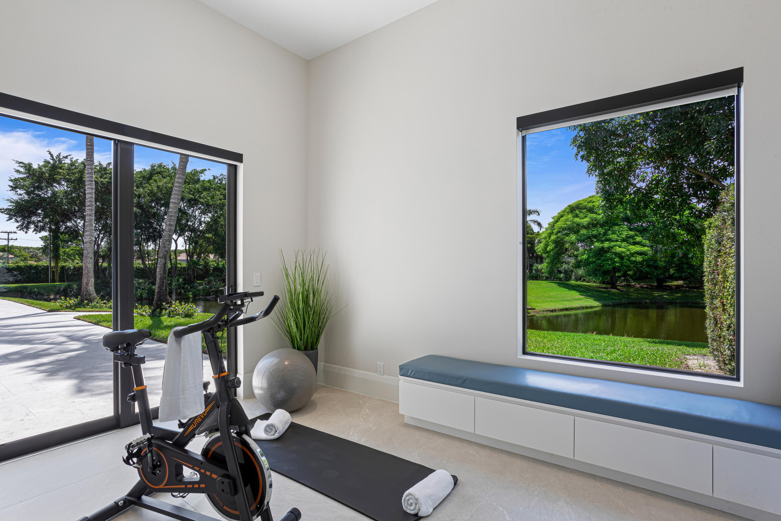 6009 Le Lac Road Boca Raton, FL 33496 - Photo 18 of 35 a room with furniture and a large window