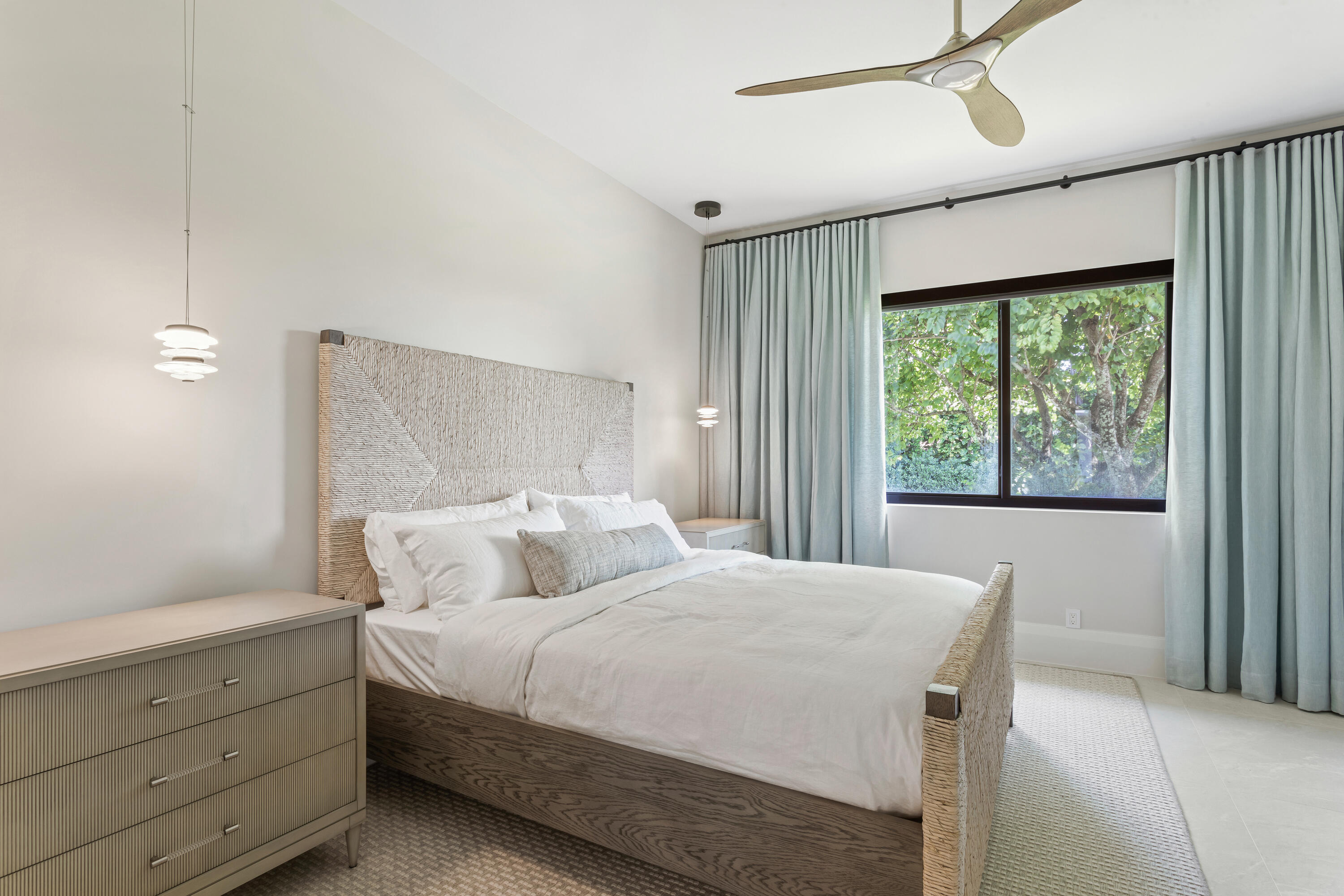 6009 Le Lac Road Boca Raton, FL 33496 - Photo 21 of 35 a bedroom with a large bed and a window